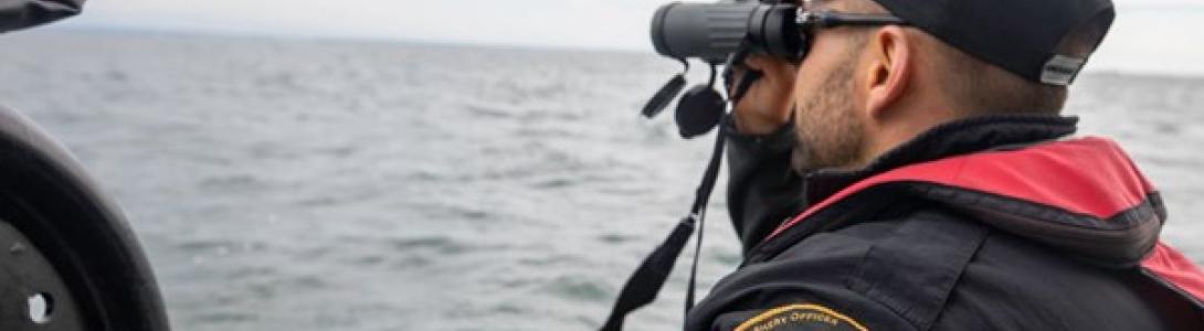 Canada DFO Officer conducting surveillance.