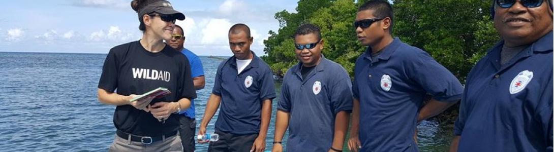 WildAid field officer working with local officers.