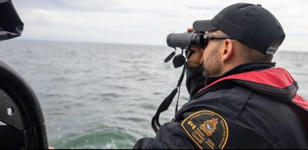 Canada DFO Officer conducting surveillance.