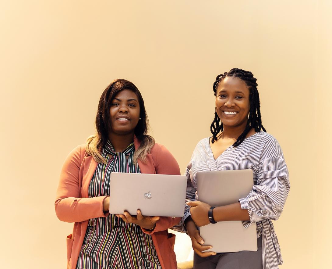 Wavemakers Stock - women holding laptops